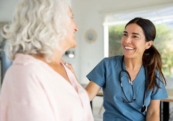 a nurse speaking with a patient. 
